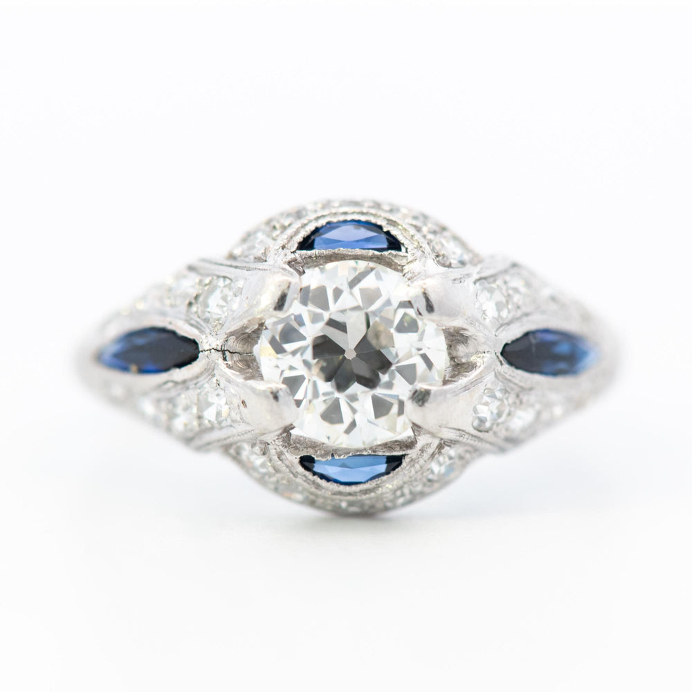 1ct Round Diamond Plat Vintage Halo Ring with Sapphire & Diamond accent