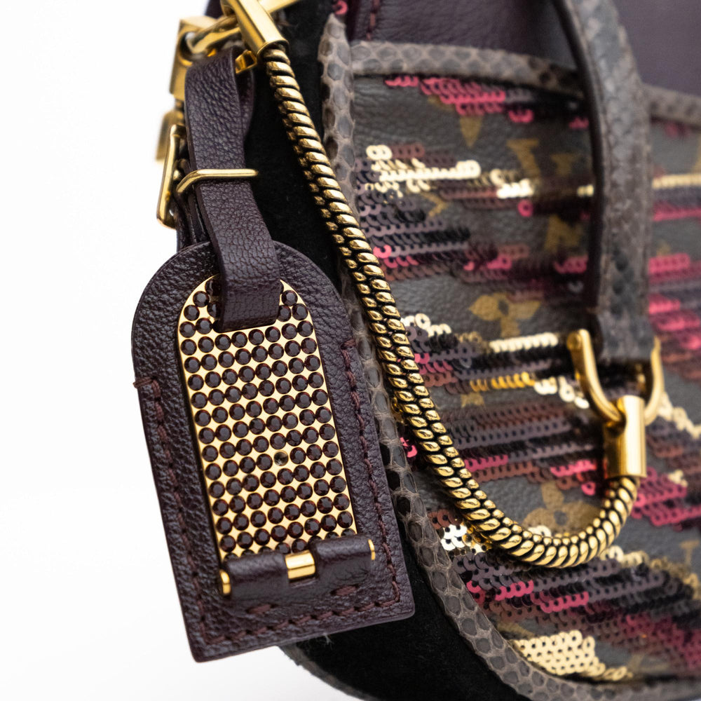 LV Monogram Savage Tiger Clutch 2011