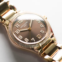 Patek Philippe Twenty4 18k RG 7300-1200R Diamond Bezel Chocolate Dial