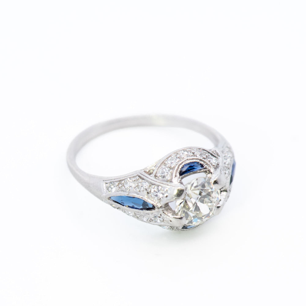 1ct Round Diamond Plat Vintage Halo Ring with Sapphire & Diamond accent