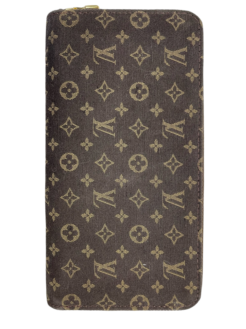 Used Brown Louis Vuitton Monogram Mini Lin Pattern Zippy Wallet Model  Number M95235 Houston,TX
